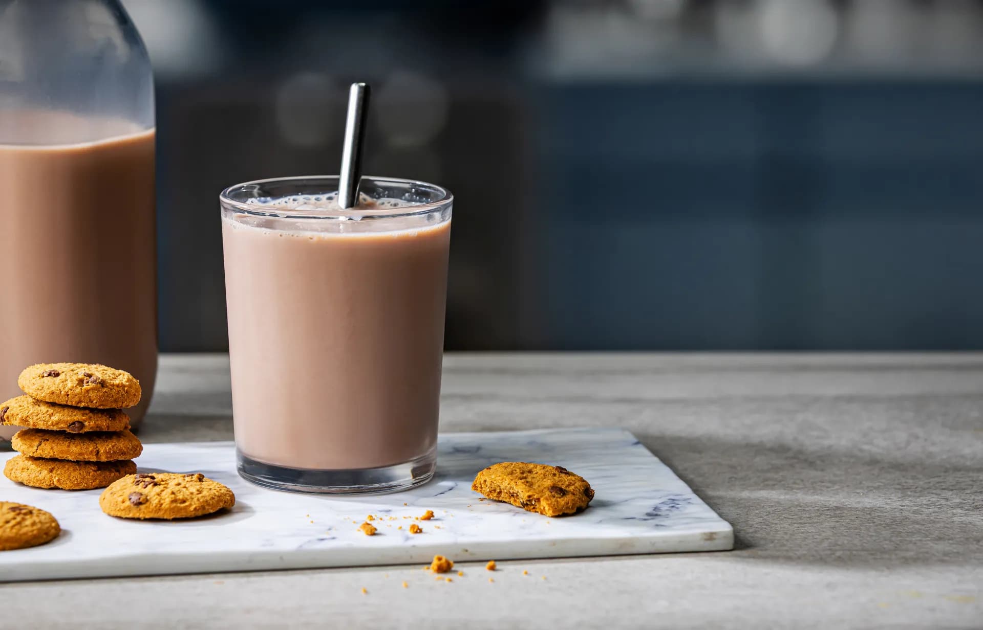 Glass of chocolate milk with cookies